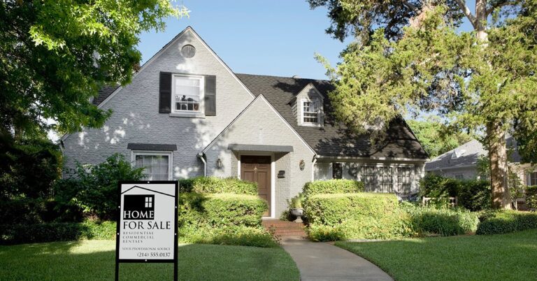 light gray house with for sale sign on lawn gettyimages 82778239 1200w 628h